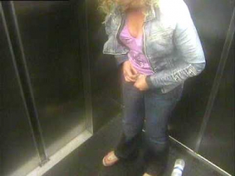Woman Pissing in Lift